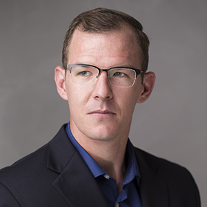 Dr. Travis L. Scholten